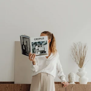 kaboompics_elegantly-dressed-female-architect-with-a-book-27612-scaled-1.webp